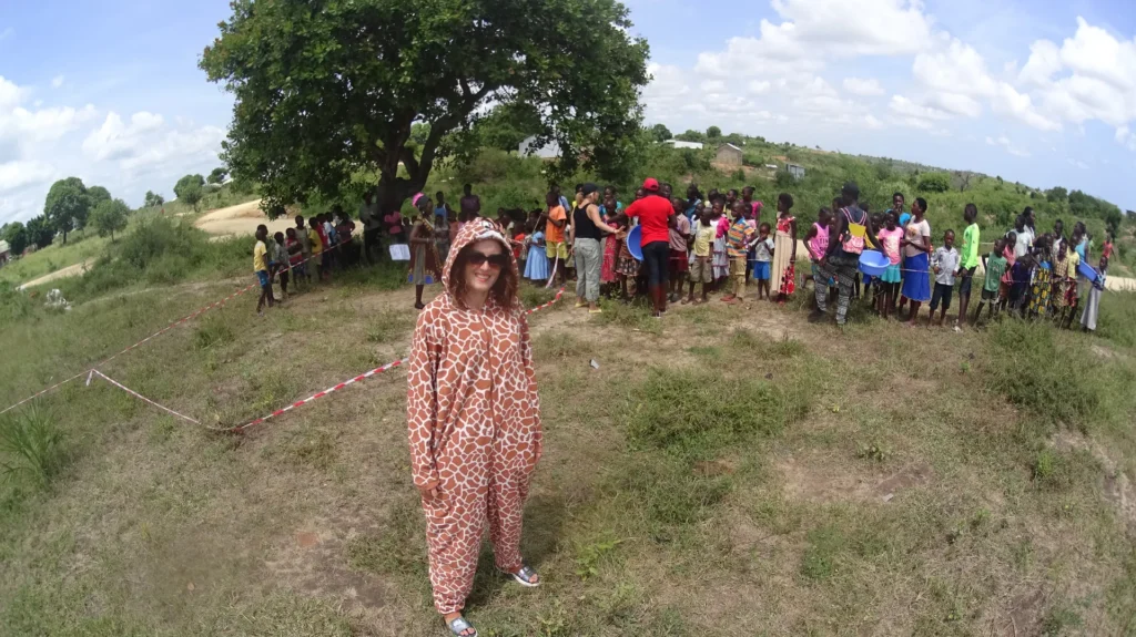 Camp participants with a Bring Life Mission volunteer