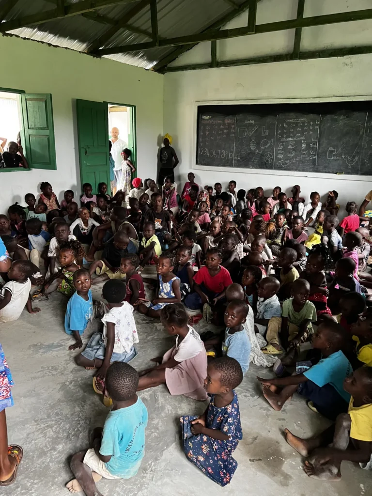 A large group of children attending a Bible program