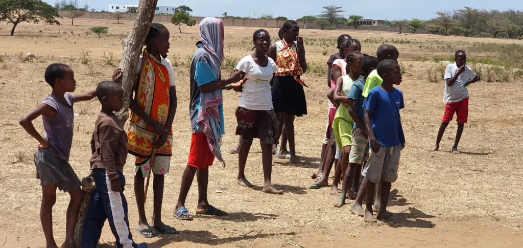 Children complete an activity during camp