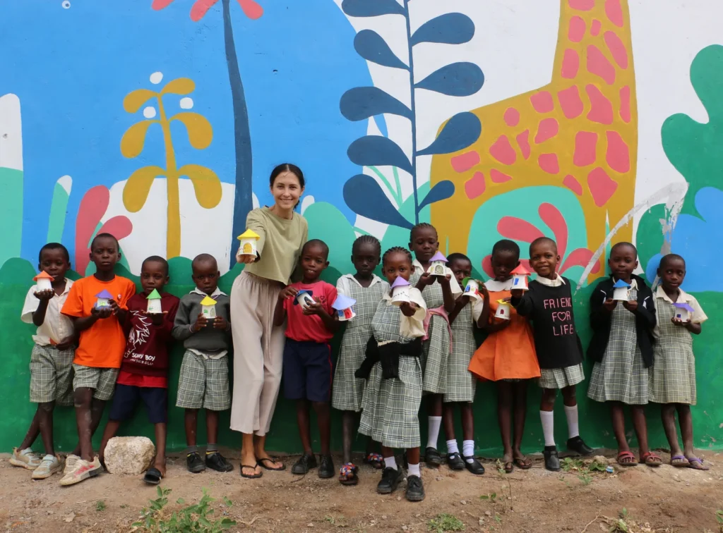 Mwangaza Bring Life Academy students with their creative work