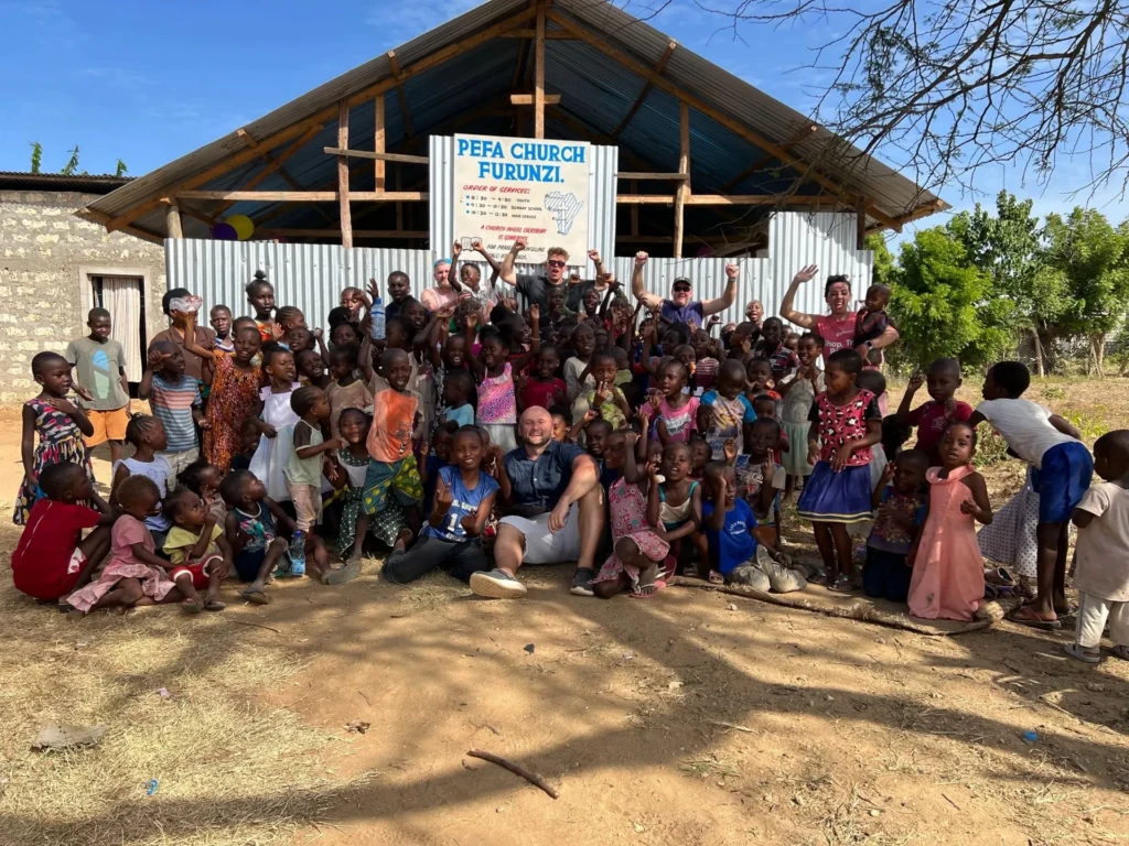 Children and volunteers at a Bring Life Mission Christian camp in Kenya