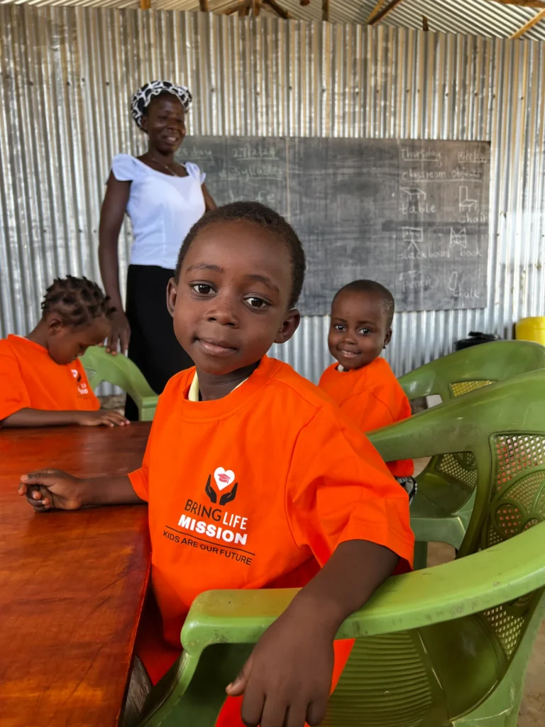 A Mwangaza Bring Life Academy student