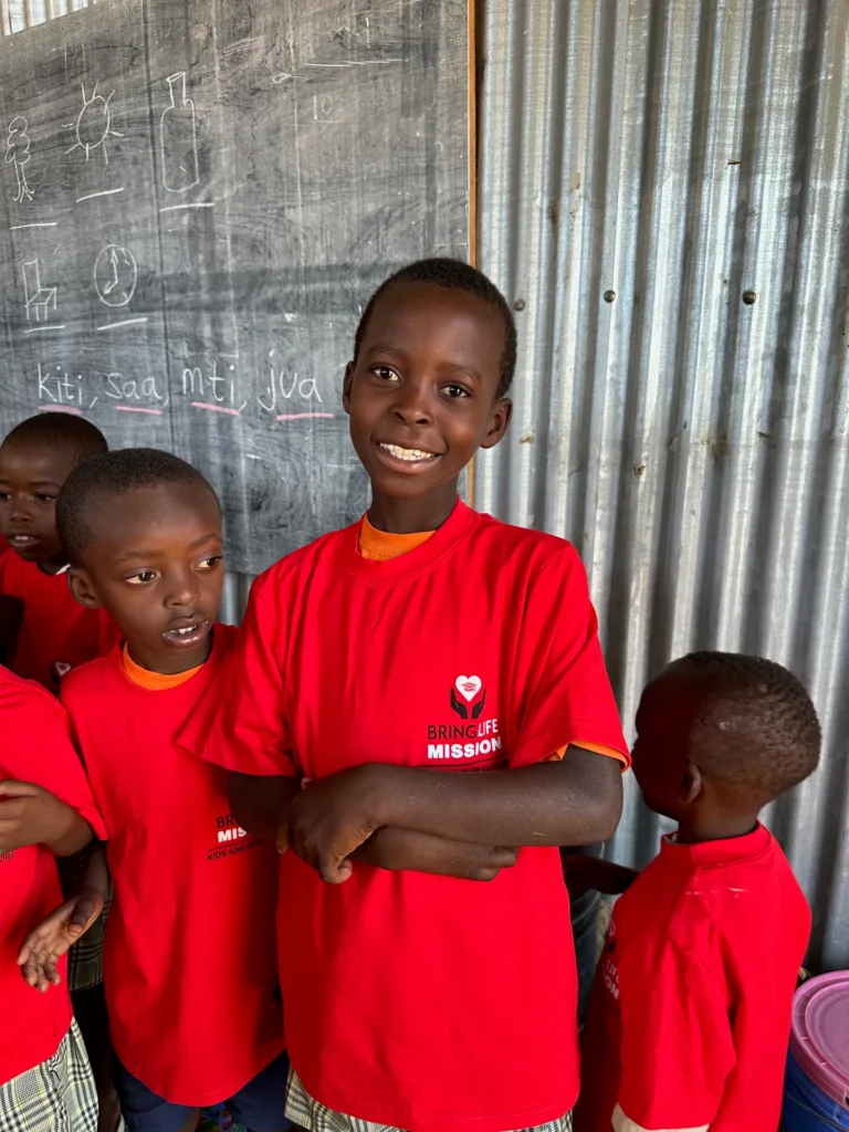 Students wearing Bring Life Mission school uniforms