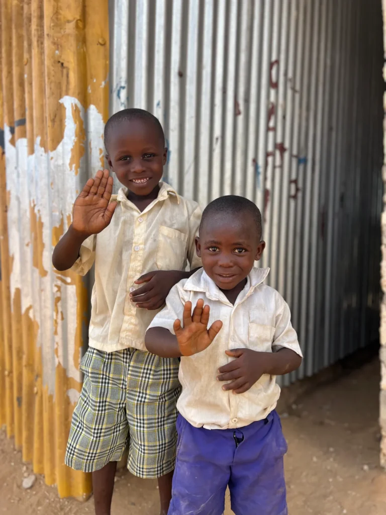 Mwangaza Bring Life Academy students welcoming visitors