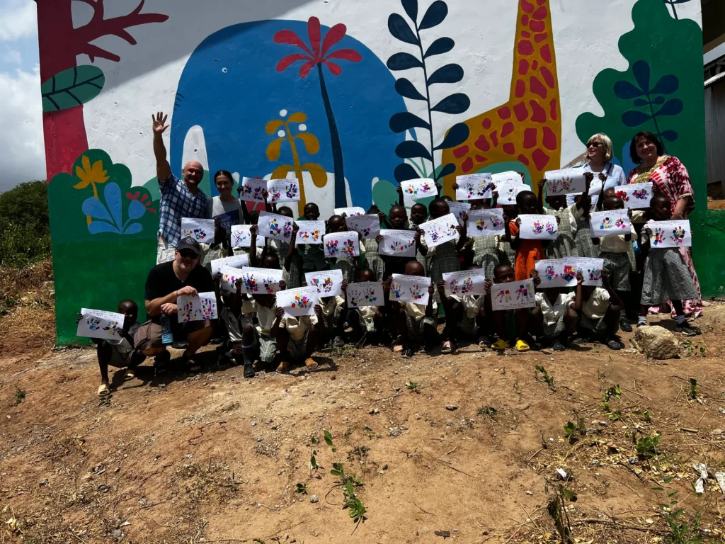 Students displaying creative work outside the school
