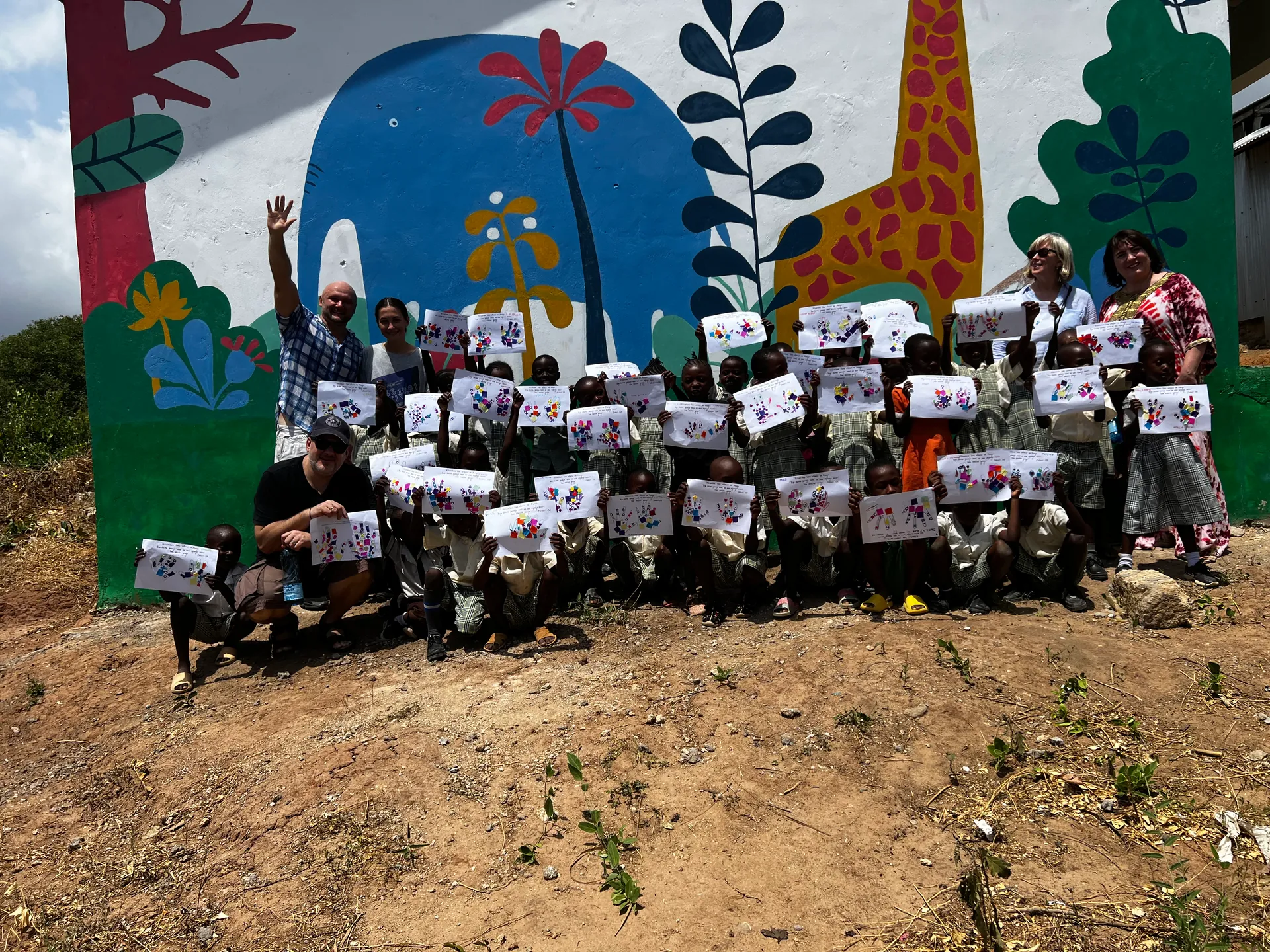 Students displaying creative work outside the school