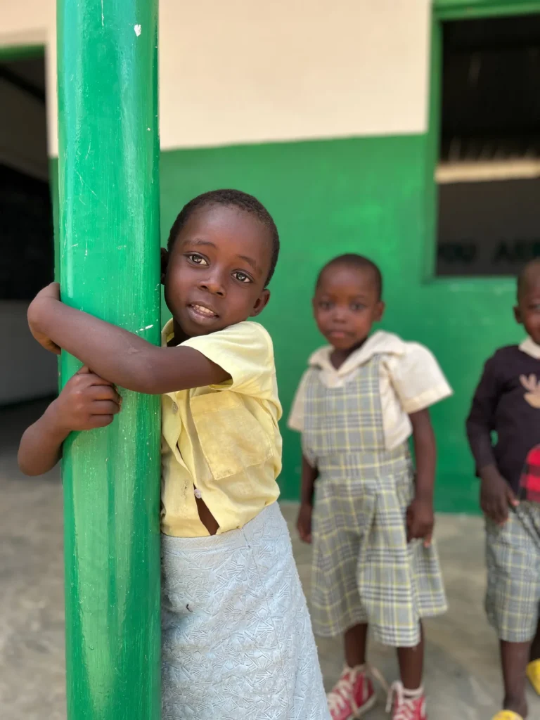 Children at the entrance to a classroom