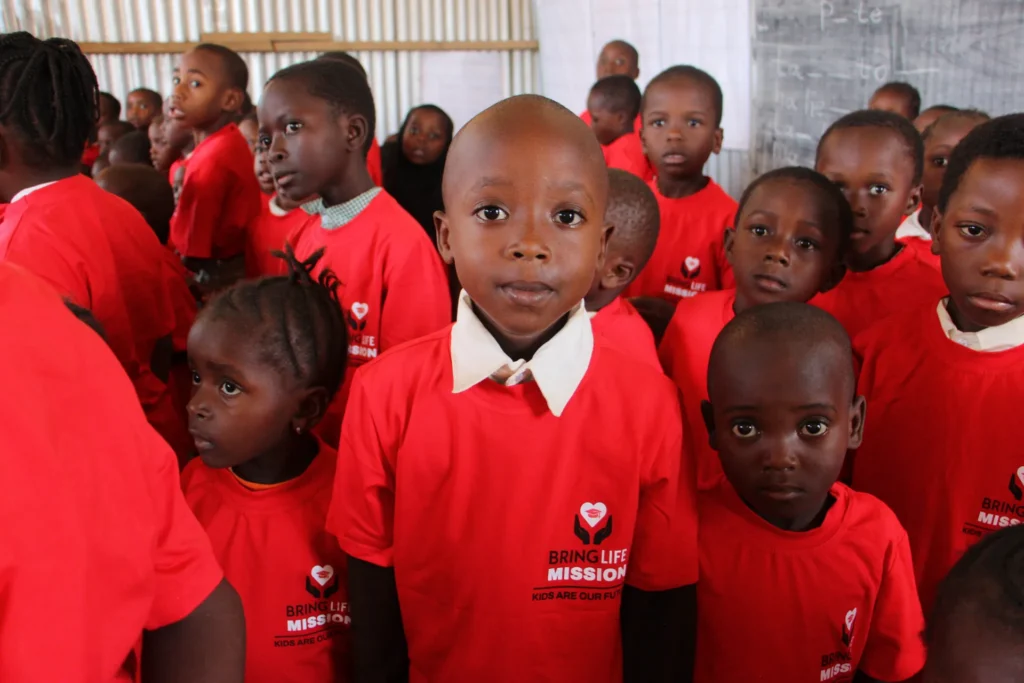 Students wearing red school uniforms