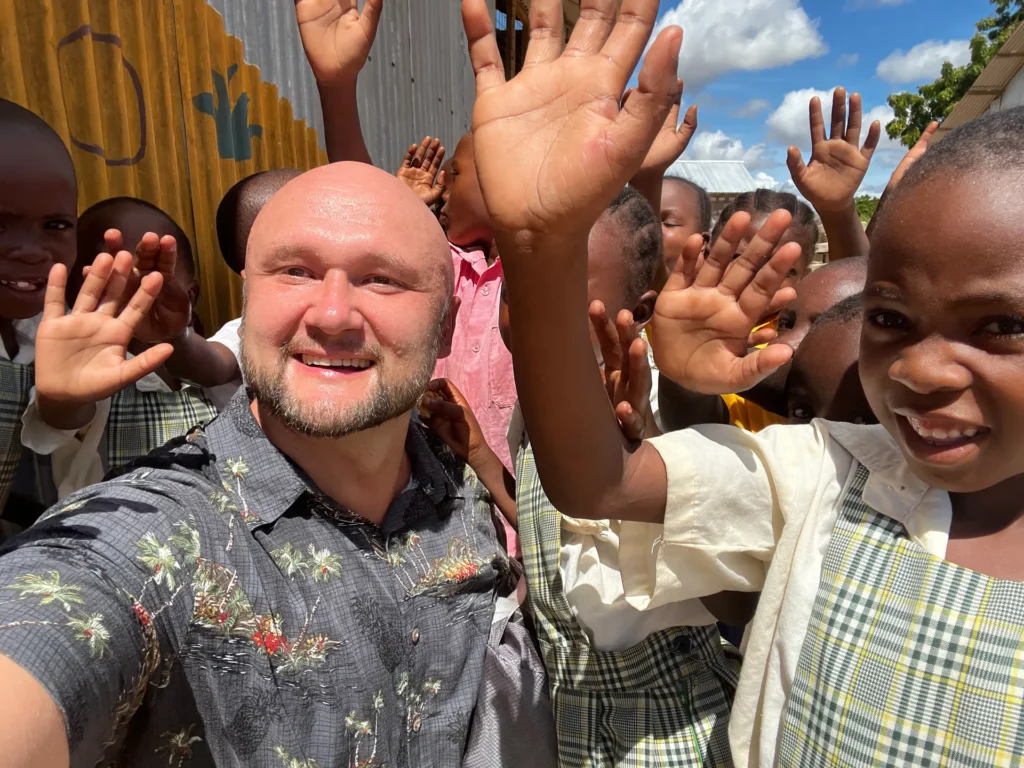 Visitors and students at Mwangaza Bring Life Academy