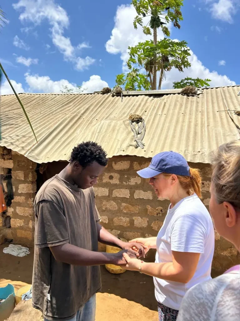 Prayer and Gospel preaching in the Furunzi slum