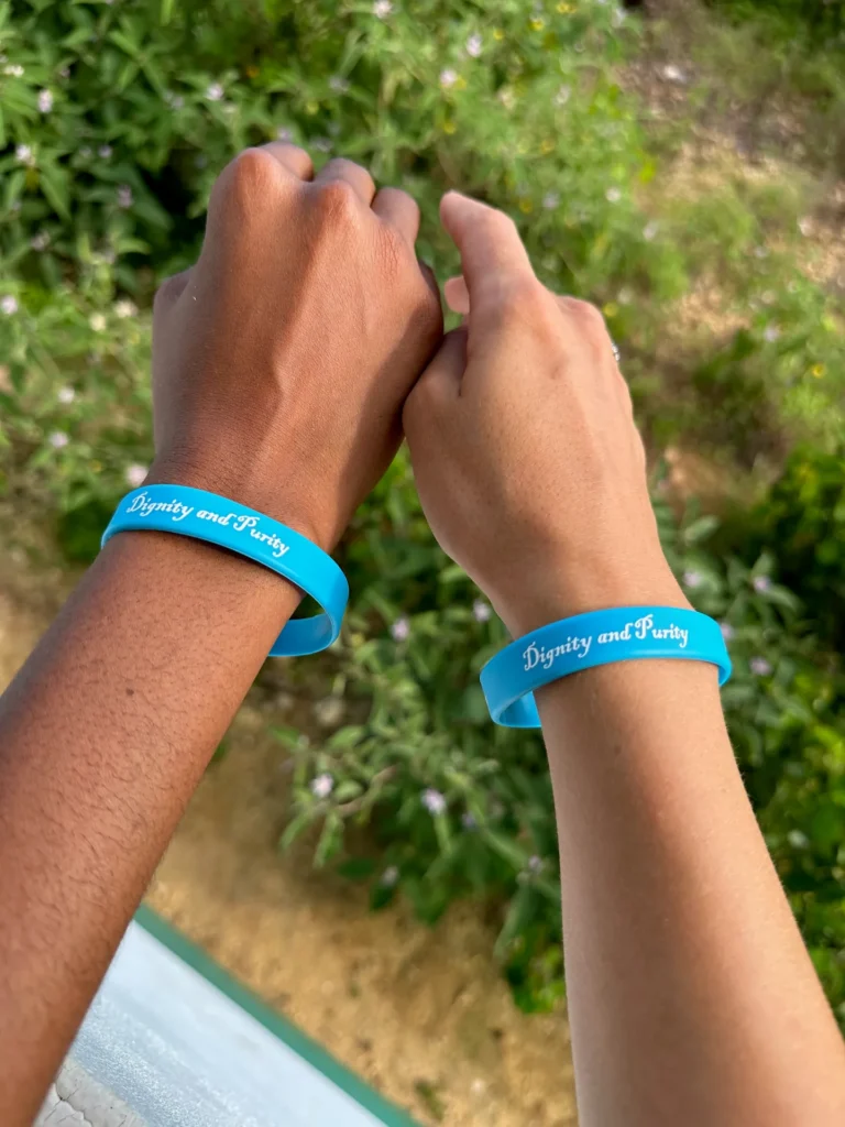 Participant bracelets at a youth training