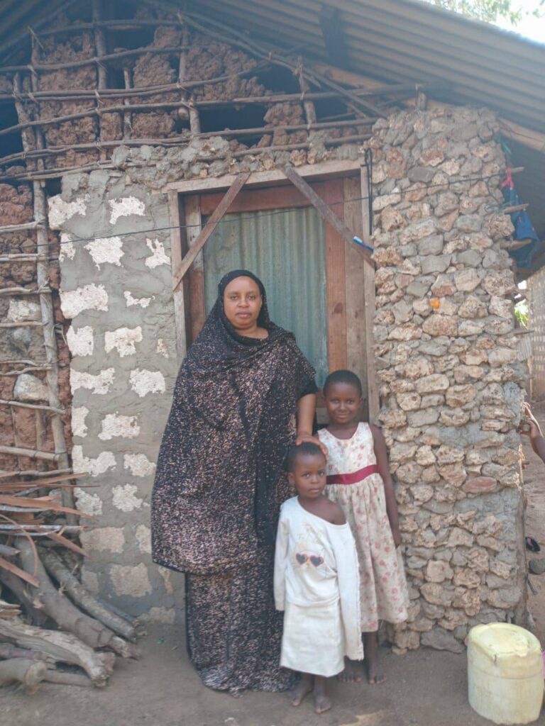Bring Life Mission team visiting families in Furunzi during Christmas holidays