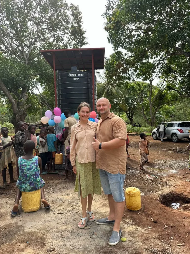 Project team near a water well in Kenya