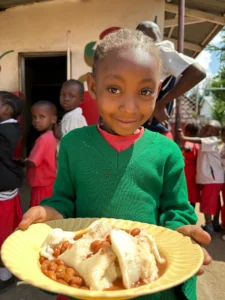 Photo update from the daily free feeding program in the Furunzi slums