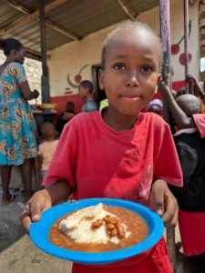 Photo update from the daily free feeding program in the Furunzi slums