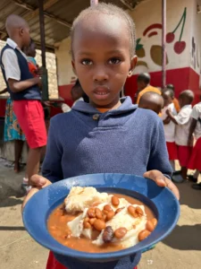 Photo update from the daily free feeding program in the Furunzi slums