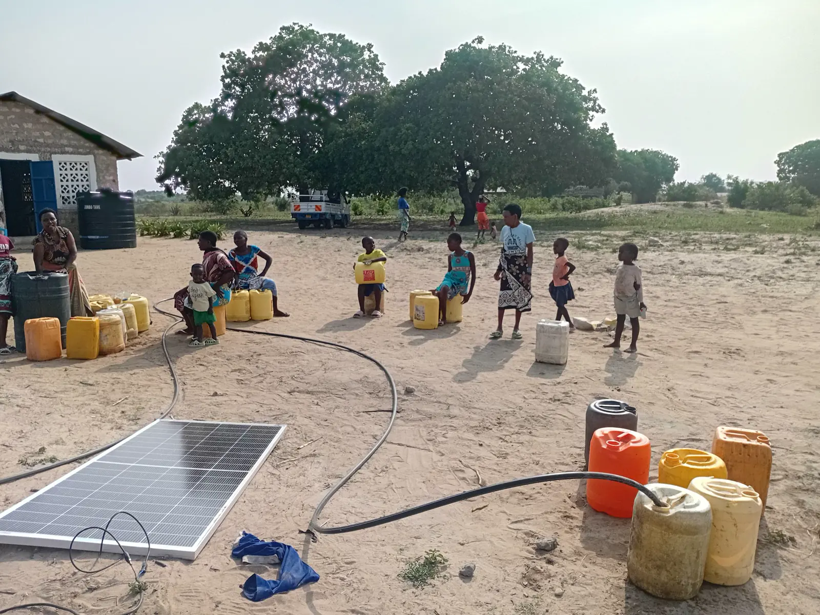 Team preparing a clean water well in Mpirani